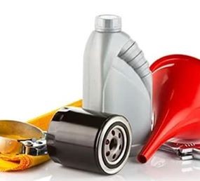 Motor oil, oil filter and funnel — oil changes, Guzman Auto Repair, Aurora IL